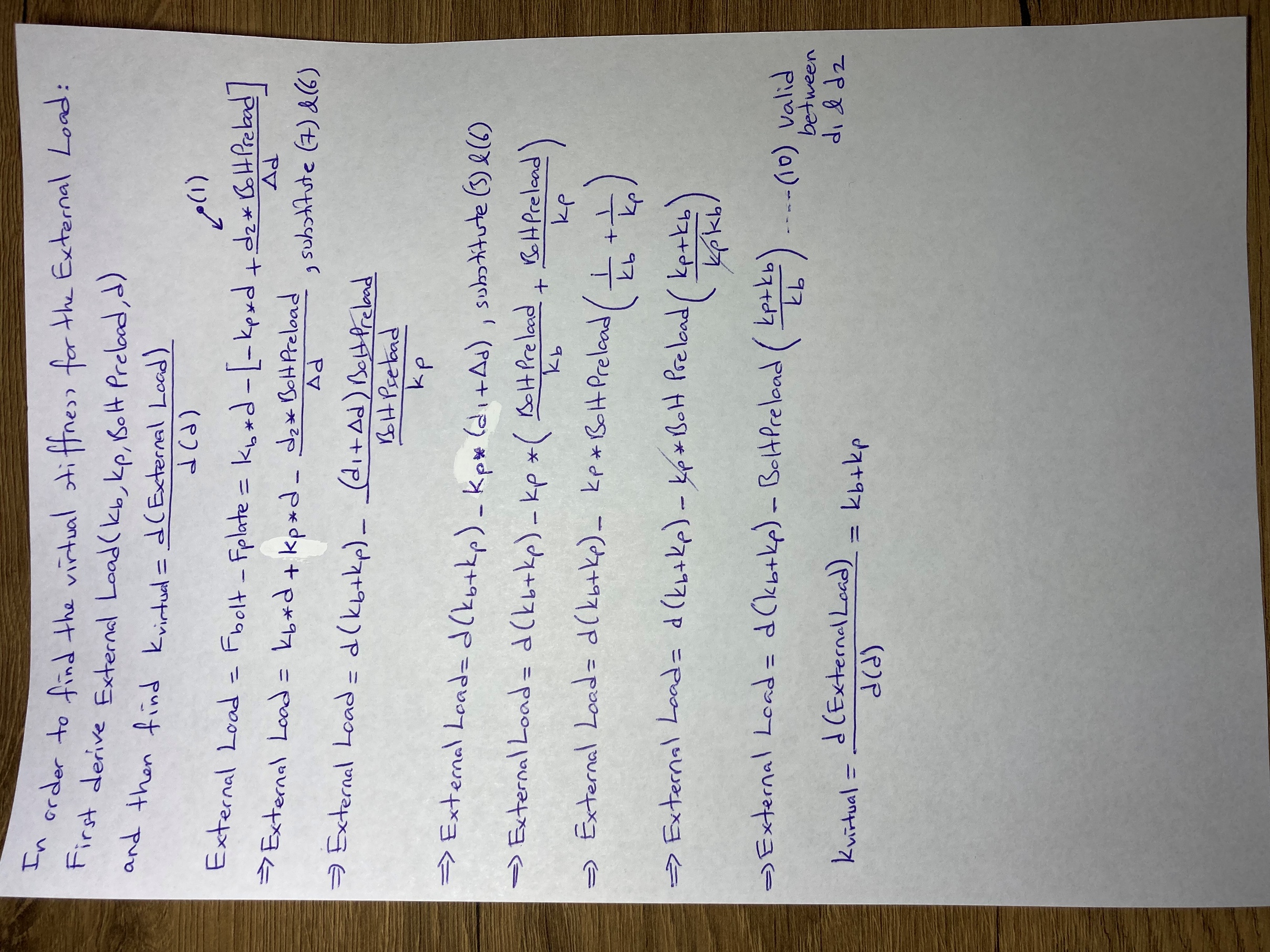 Handwritten calculation derivation page 2